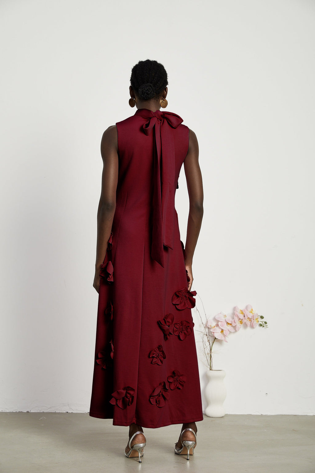 Magali Red Sleeveless Maxi Dress with Faux Flower & Bow-Tie Embellishment