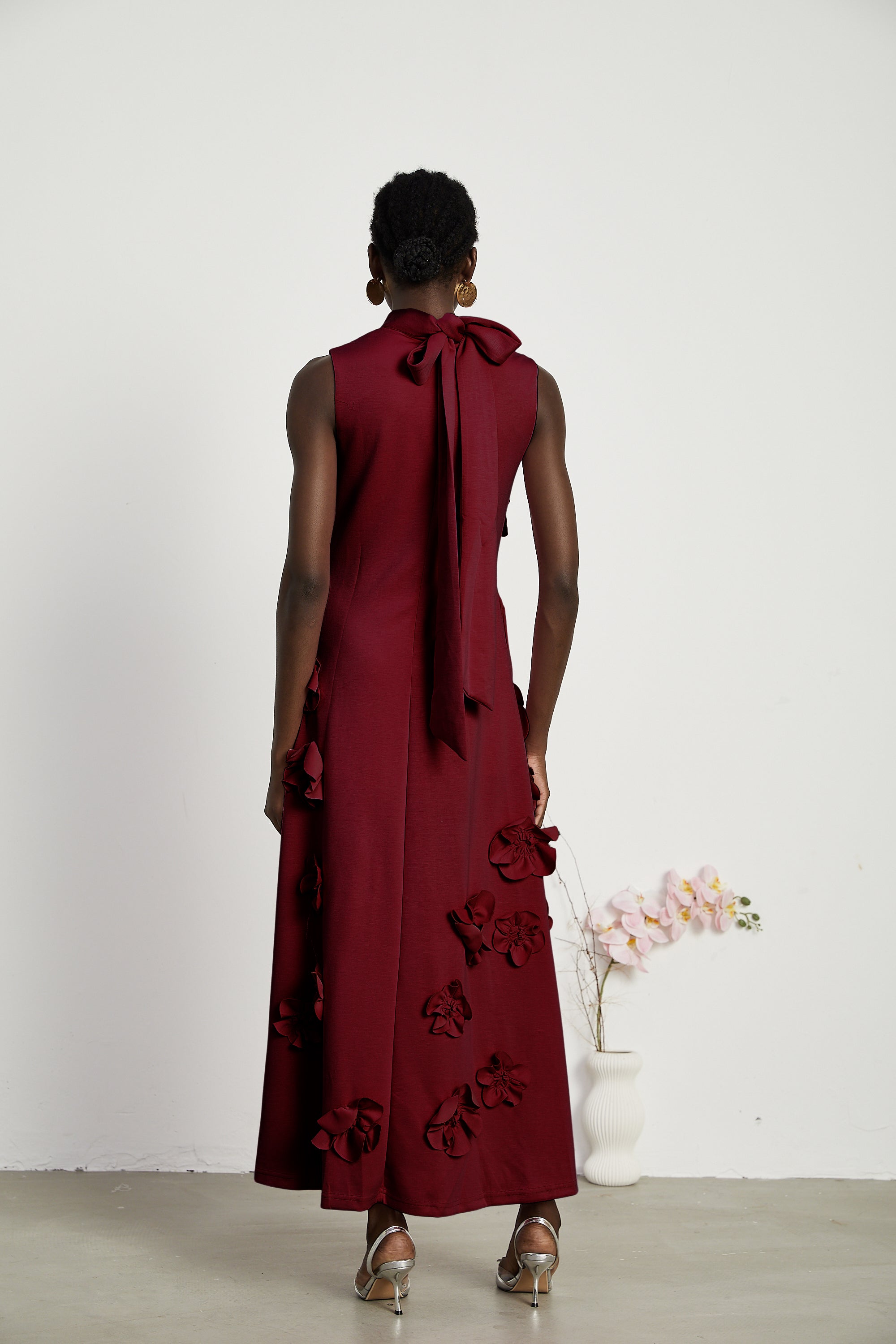 Magali Red Sleeveless Maxi Dress with Faux Flower & Bow-Tie Embellishment