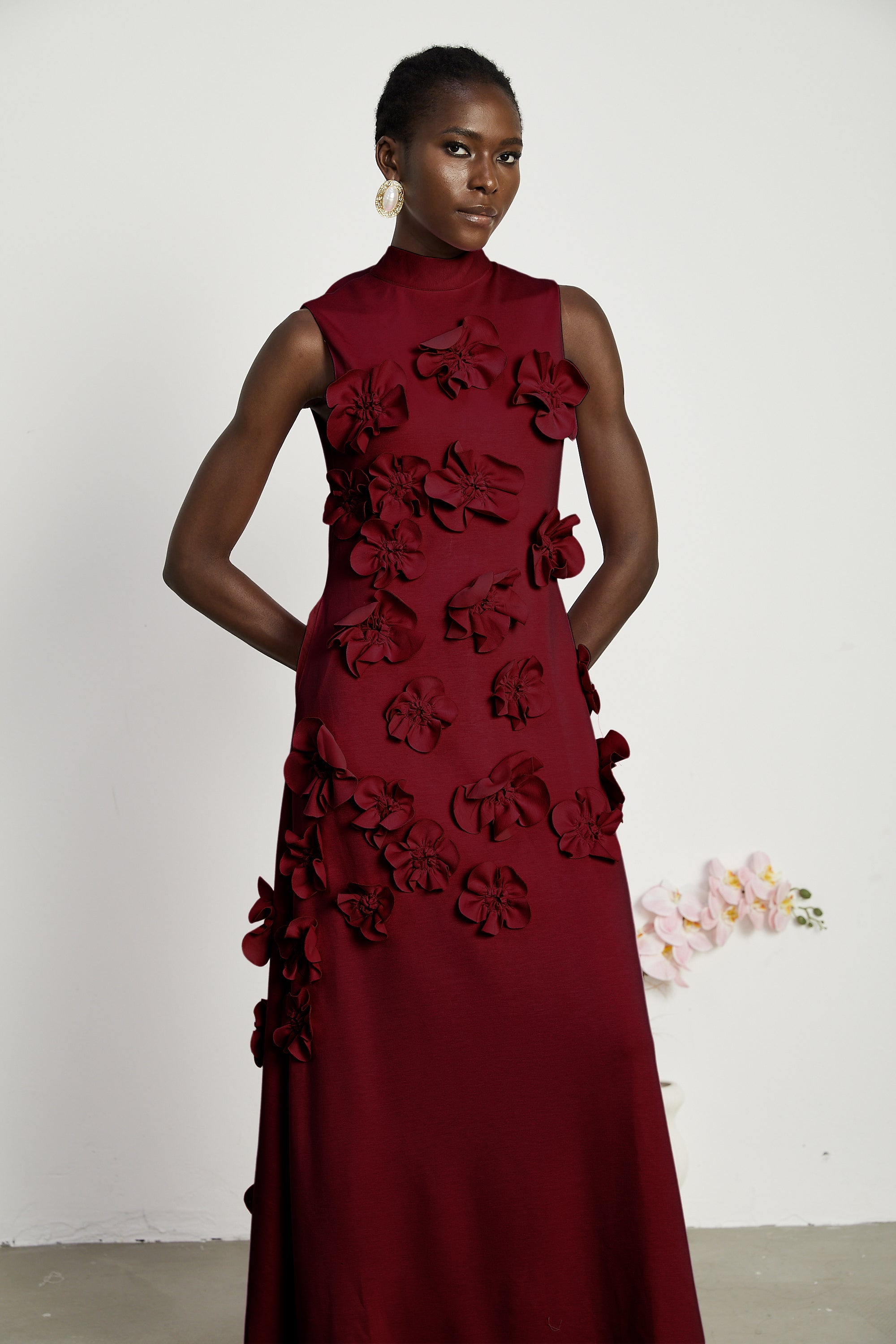 Magali Red Sleeveless Maxi Dress with Faux Flower & Bow-Tie Embellishment