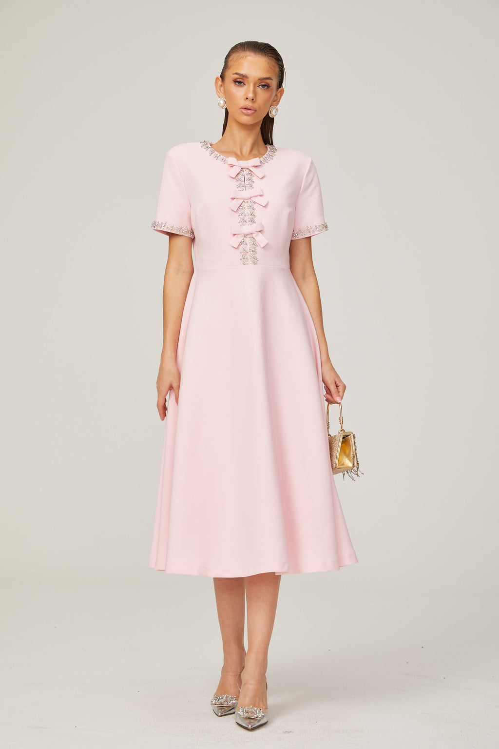 Cassiopeia crystal-accented pink bow midi dress