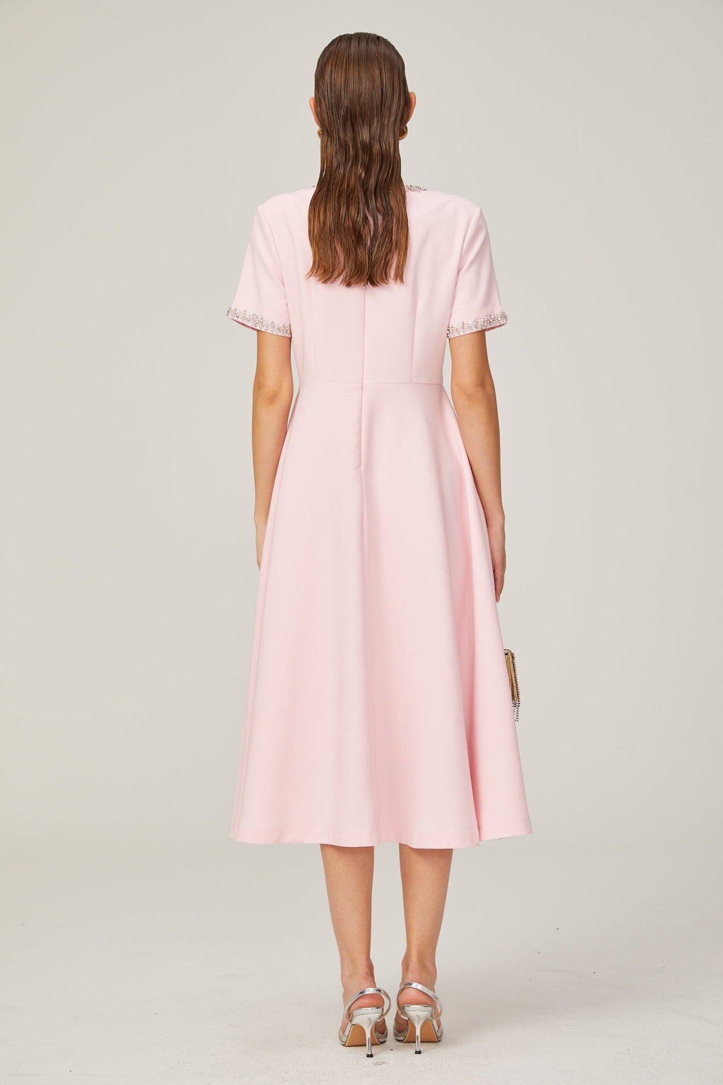 Cassiopeia crystal-accented pink bow midi dress