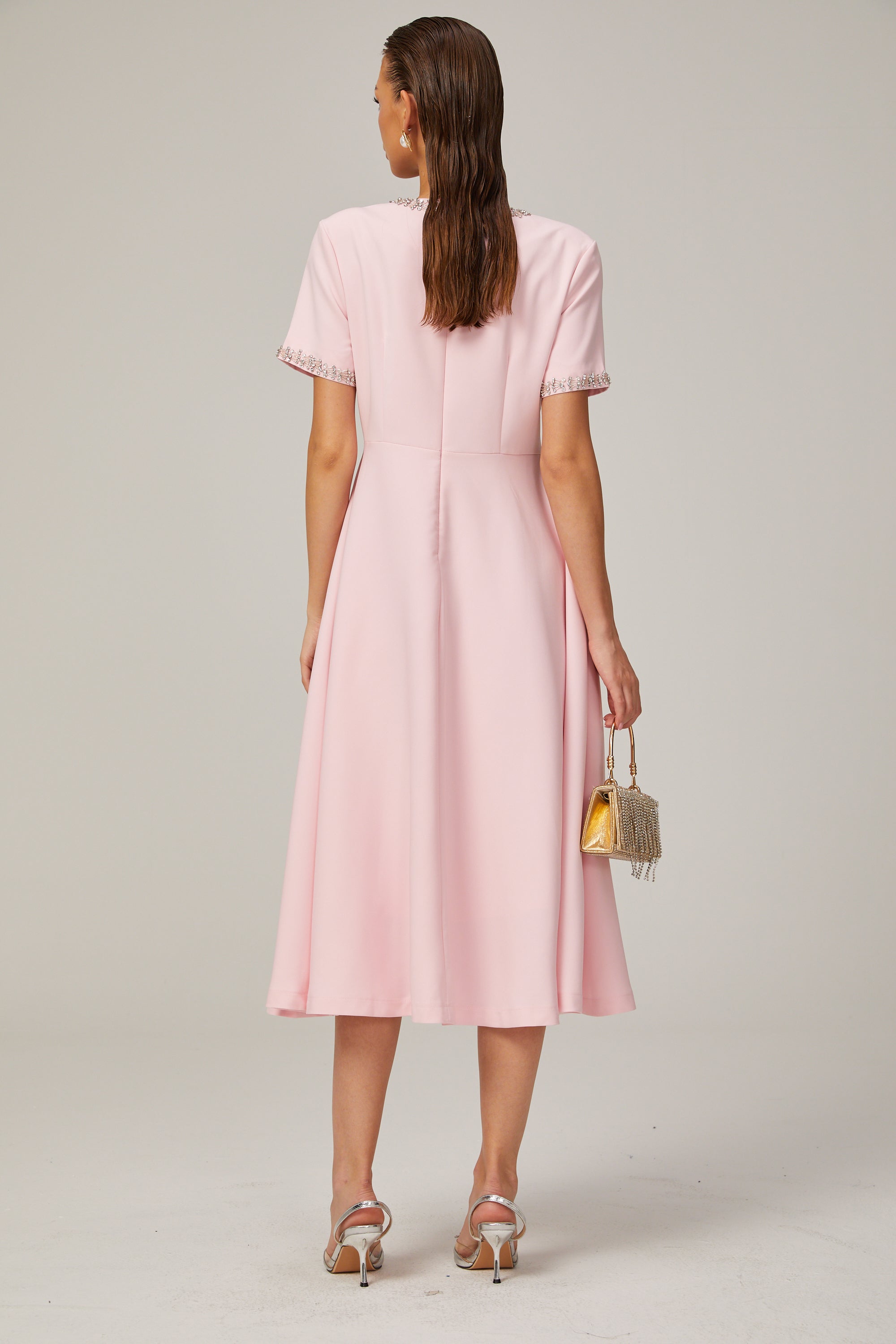 Cassiopeia crystal-accented pink bow midi dress