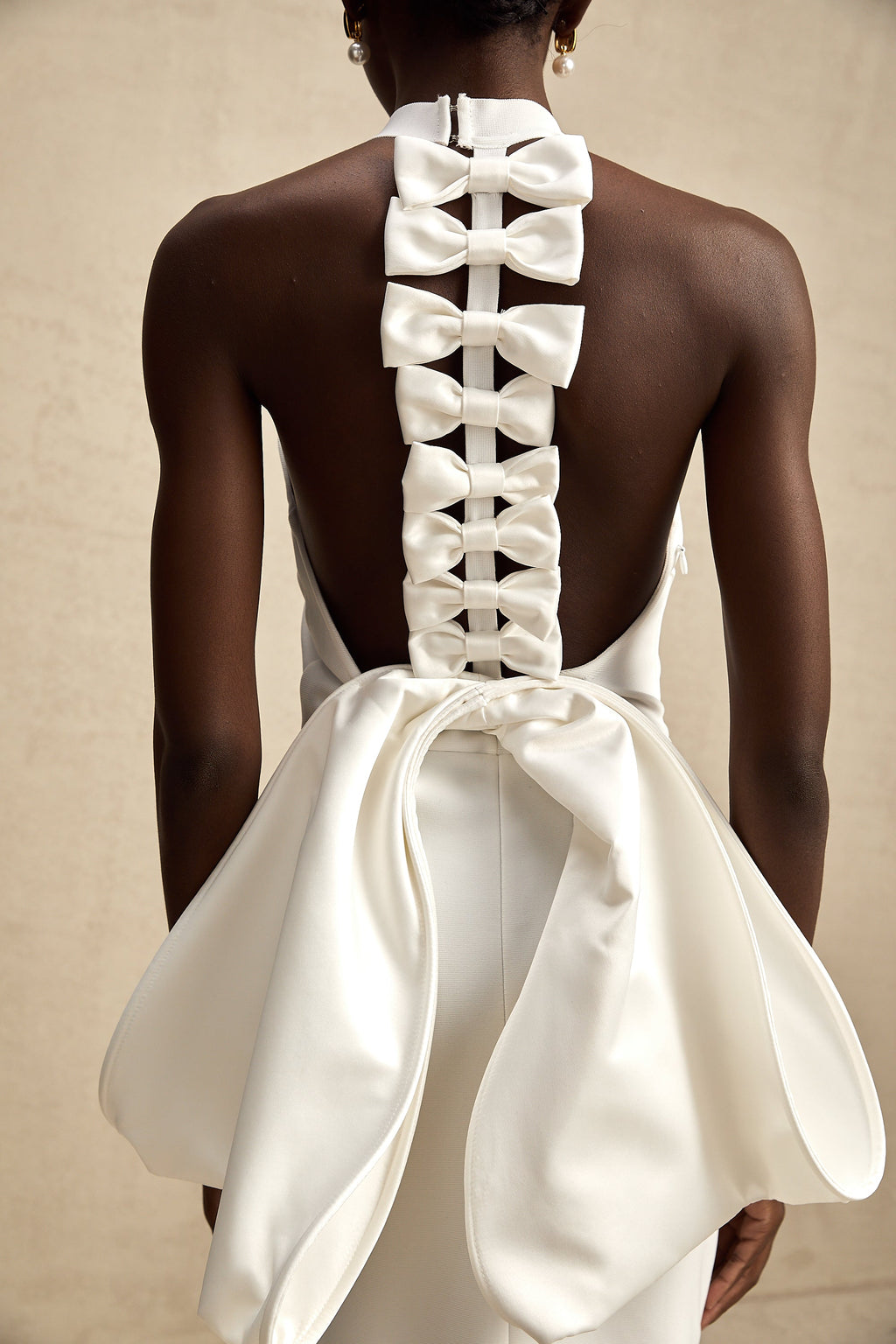 Capucine white oversize-bow bandage dress