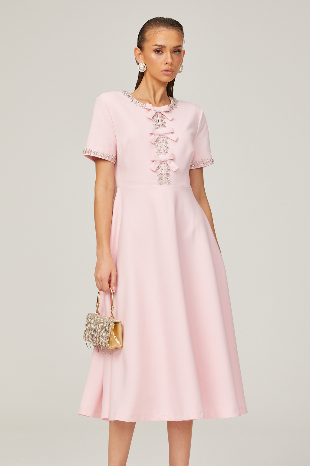 Cassiopeia crystal-accented pink bow midi dress