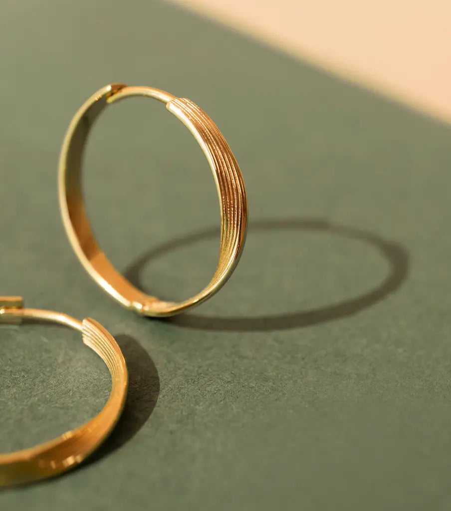 Oorbellen - large swirled click