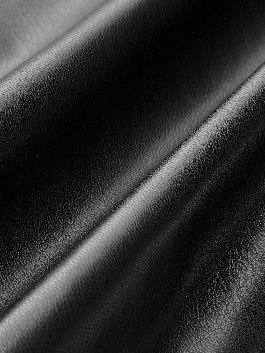 Cathi | Plisserad läderkjol med slits – Elegant och trendig look