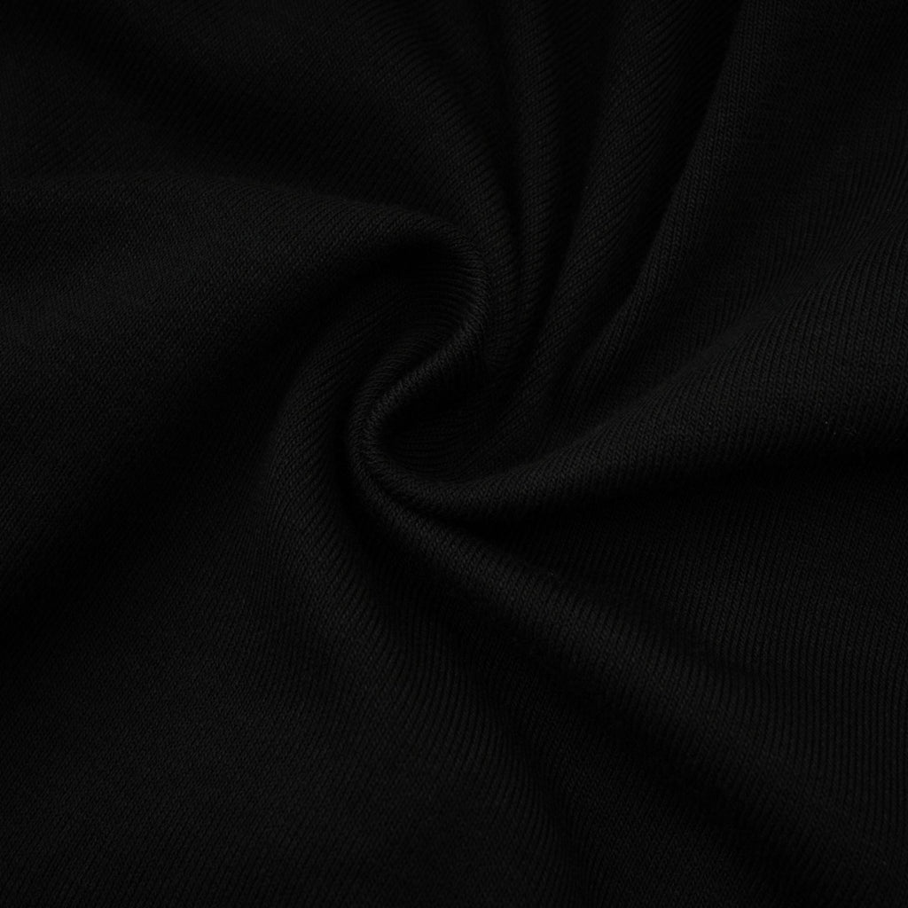 Anaïs svart topp med öppen framsida och rynkad passform