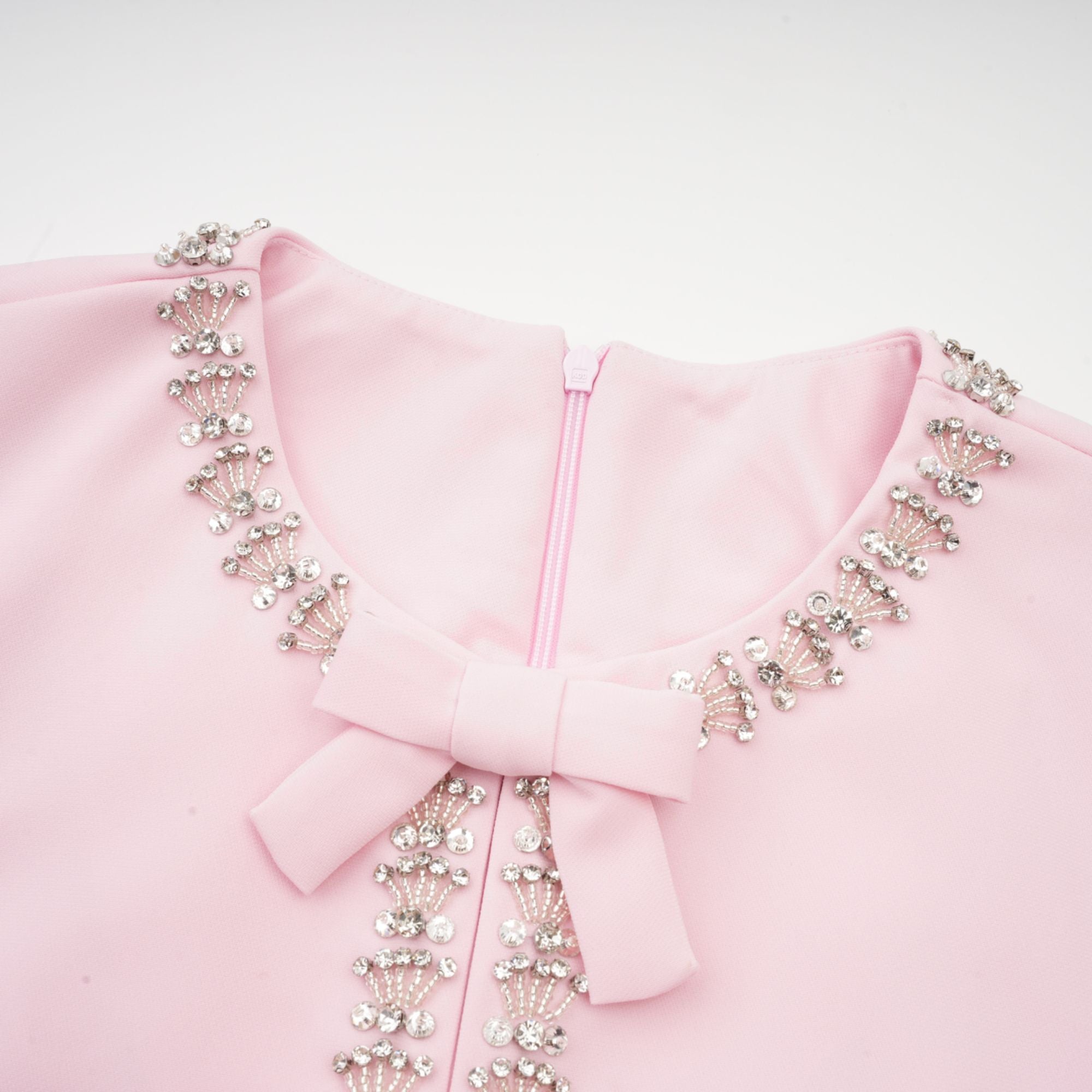 Cassiopeia crystal-accented pink bow midi dress
