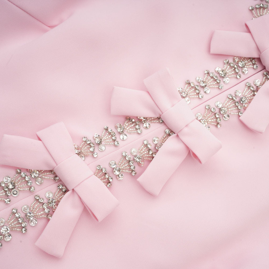 Cassiopeia crystal-accented pink bow midi dress