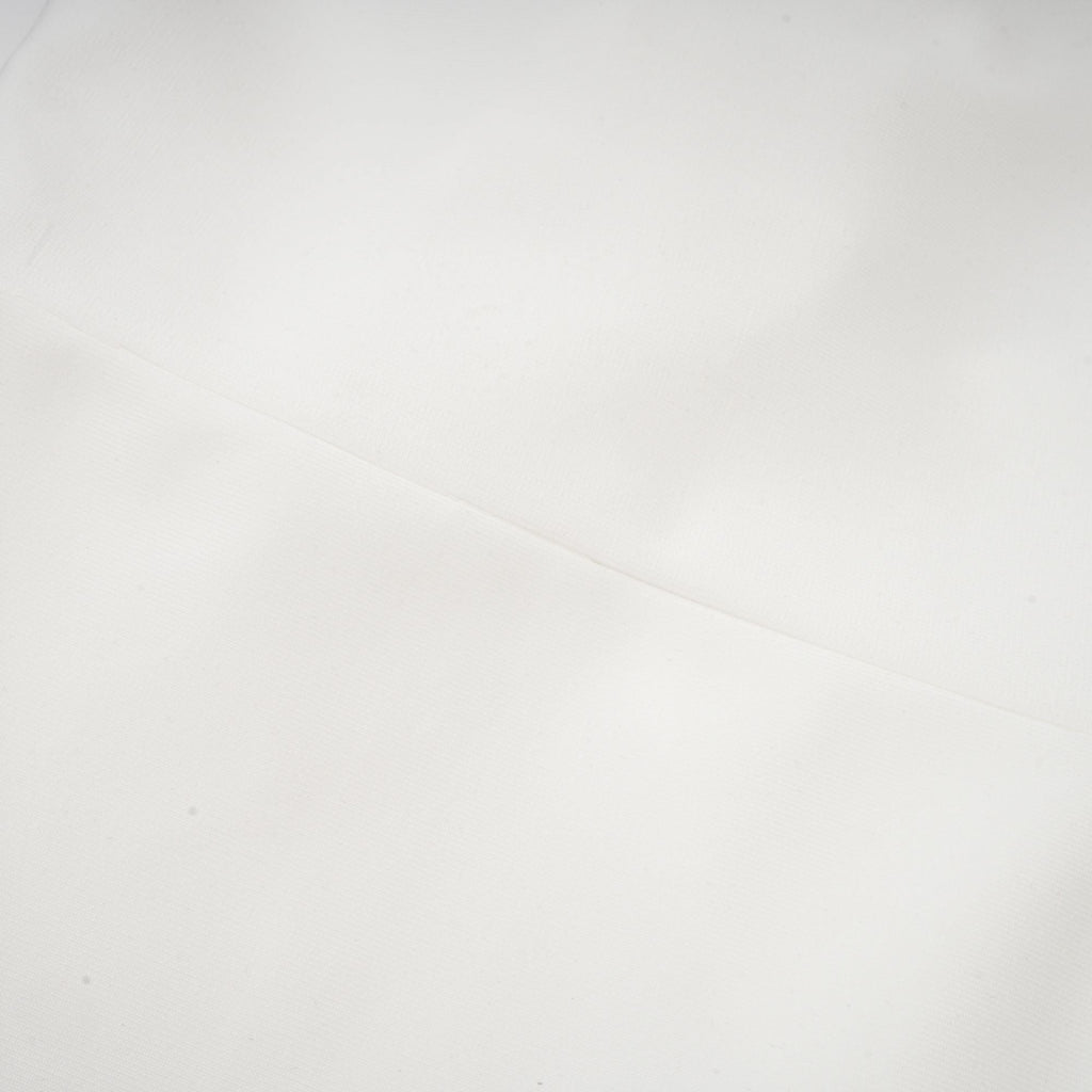 Capucine white oversize-bow bandage dress