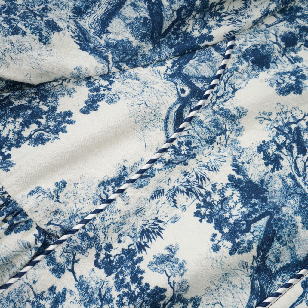 Adélaïde midiklänning med grafiskt tryck i blå 