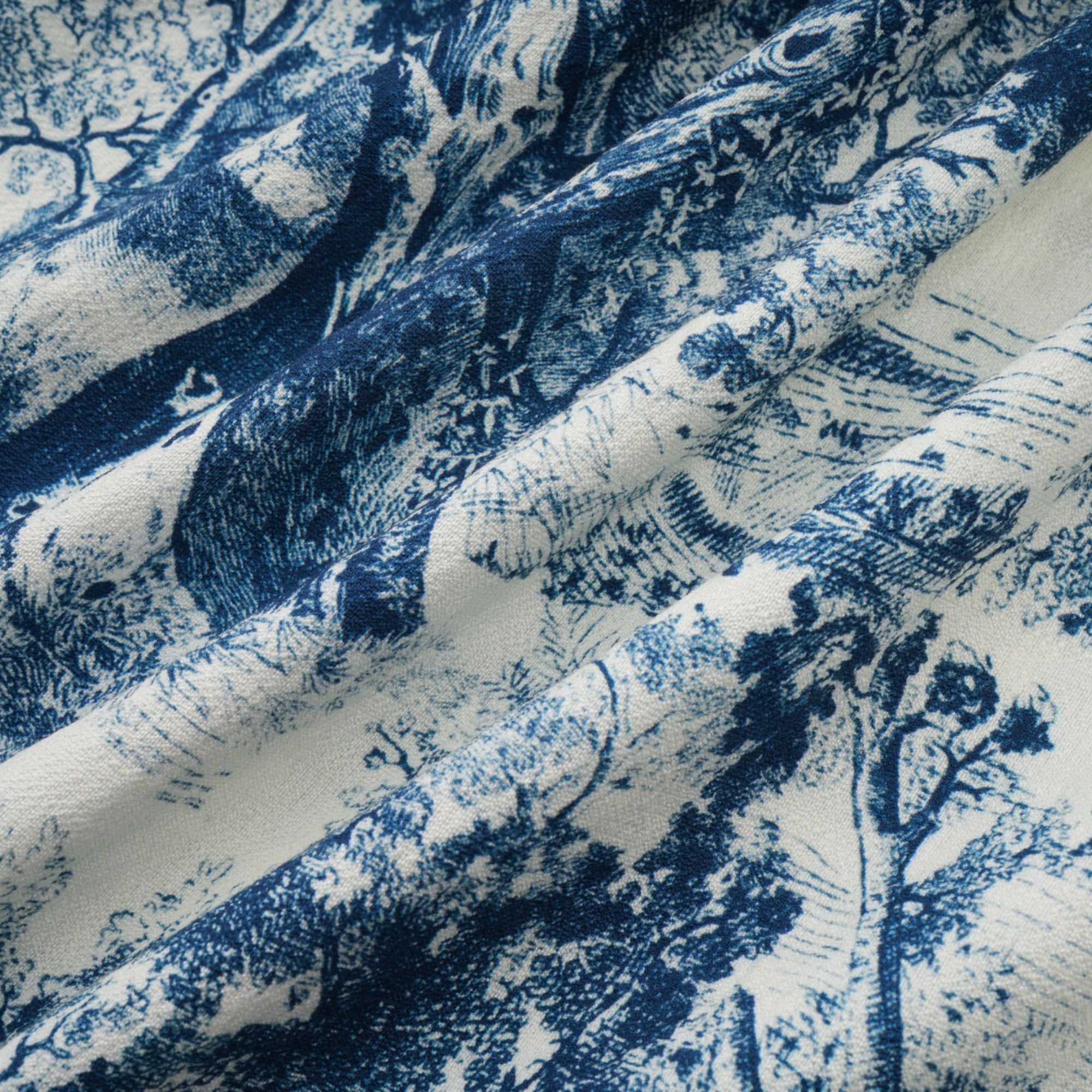 Adélaïde midiklänning med grafiskt tryck i blå 