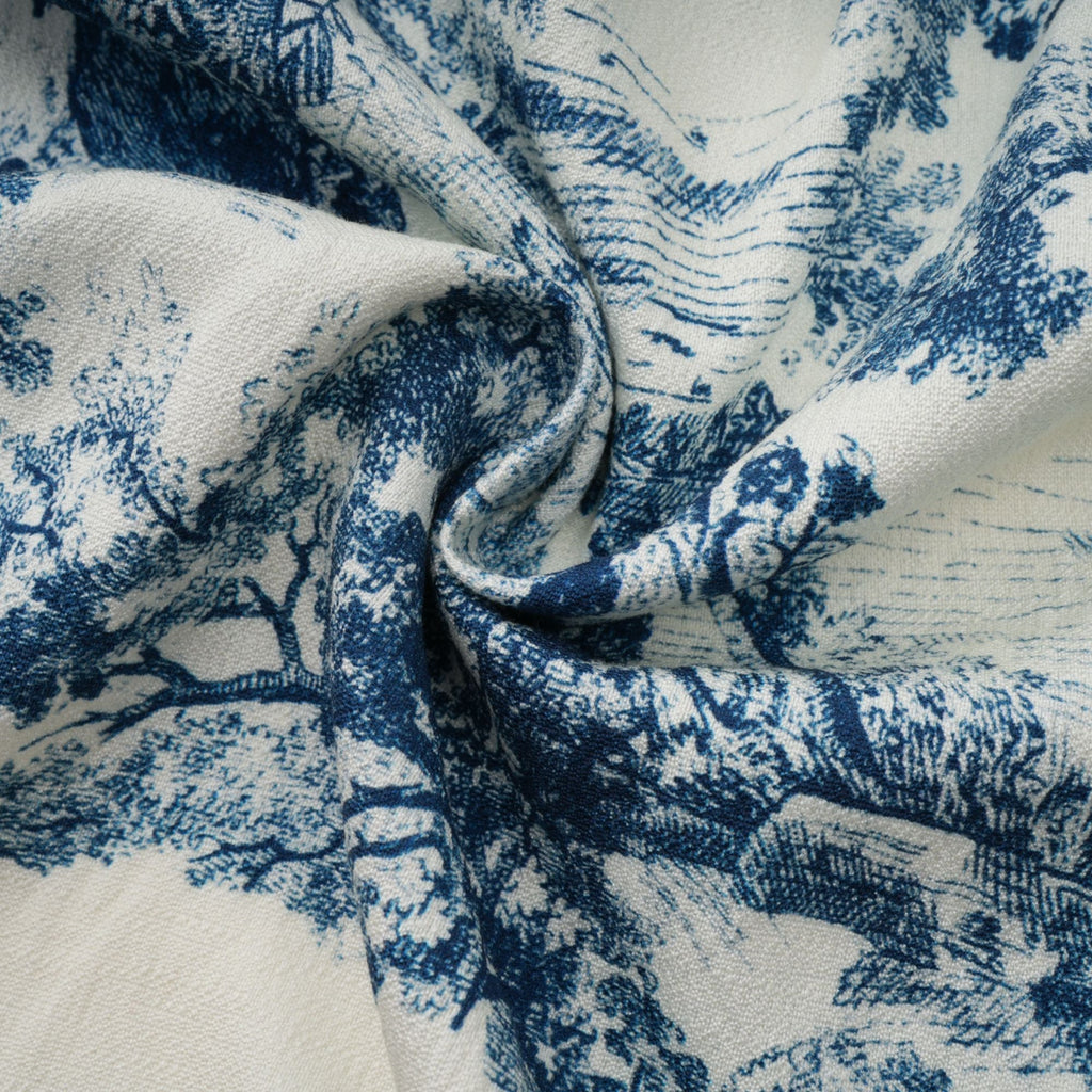 Adélaïde midiklänning med grafiskt tryck i blå 