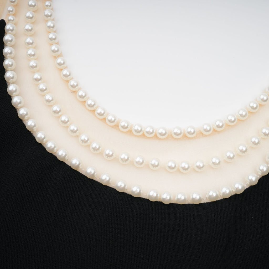 Danaé black faux-pearl-embellished mini dress