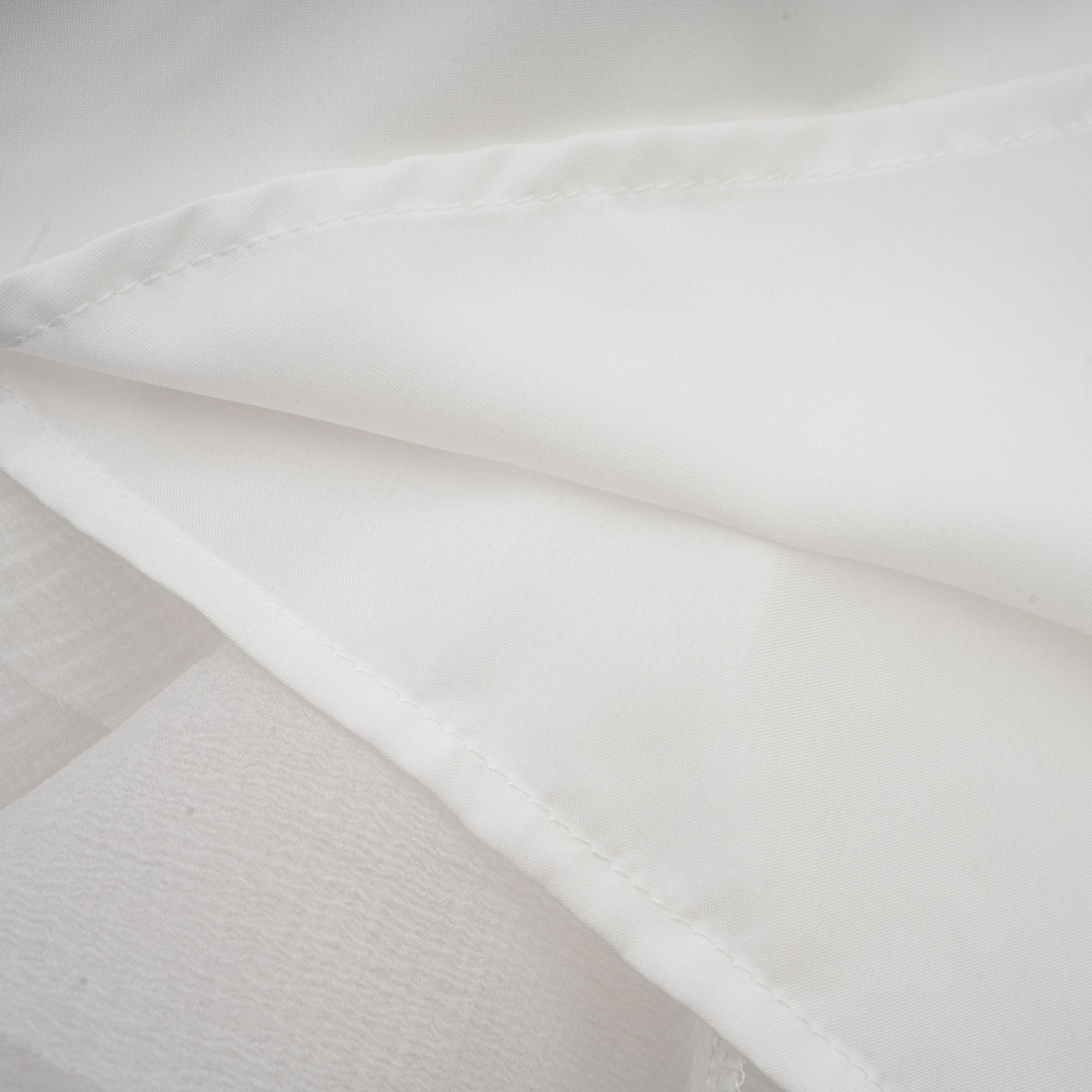 Anaïs halvtransparent utsvängd miniklänning