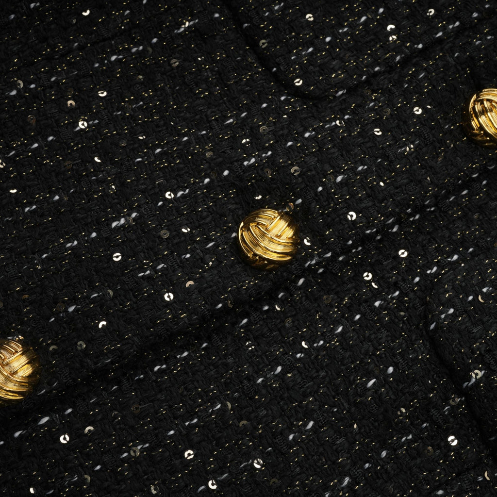 Audrey svart tweed miniklänning med paljettpaneler