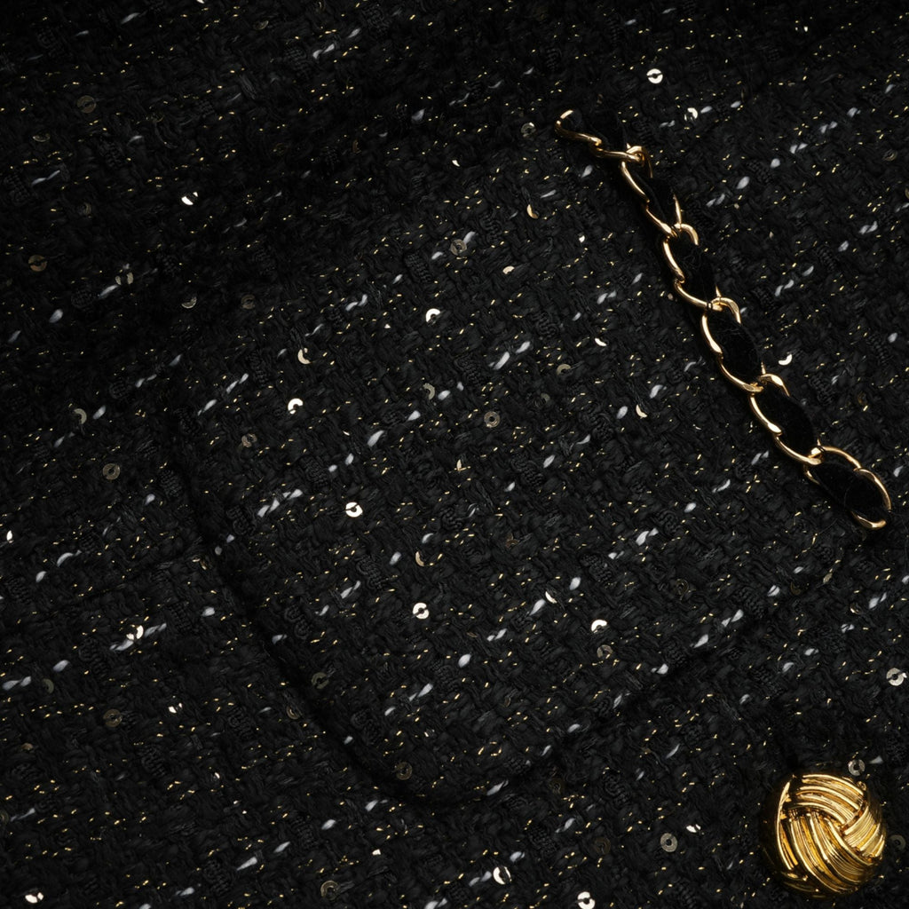 Audrey svart tweed miniklänning med paljettpaneler