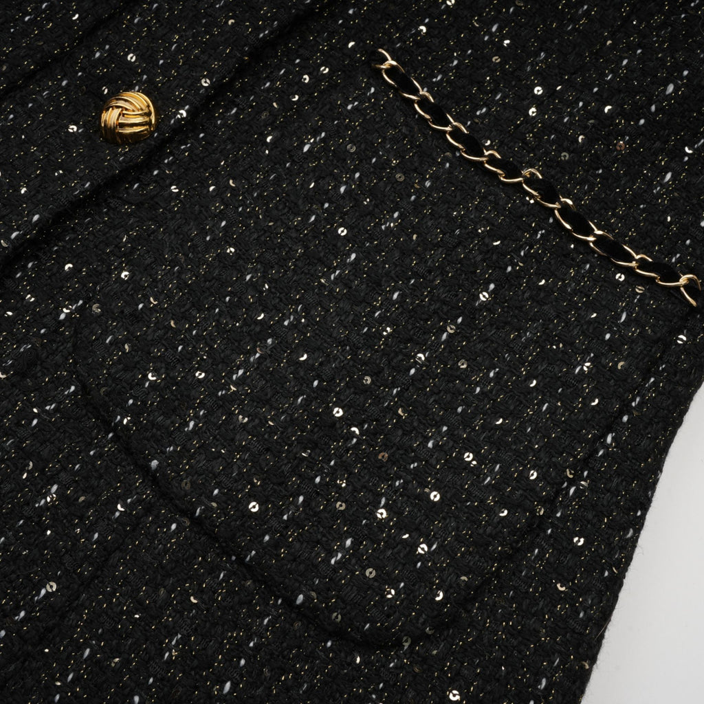 Audrey svart tweed miniklänning med paljettpaneler
