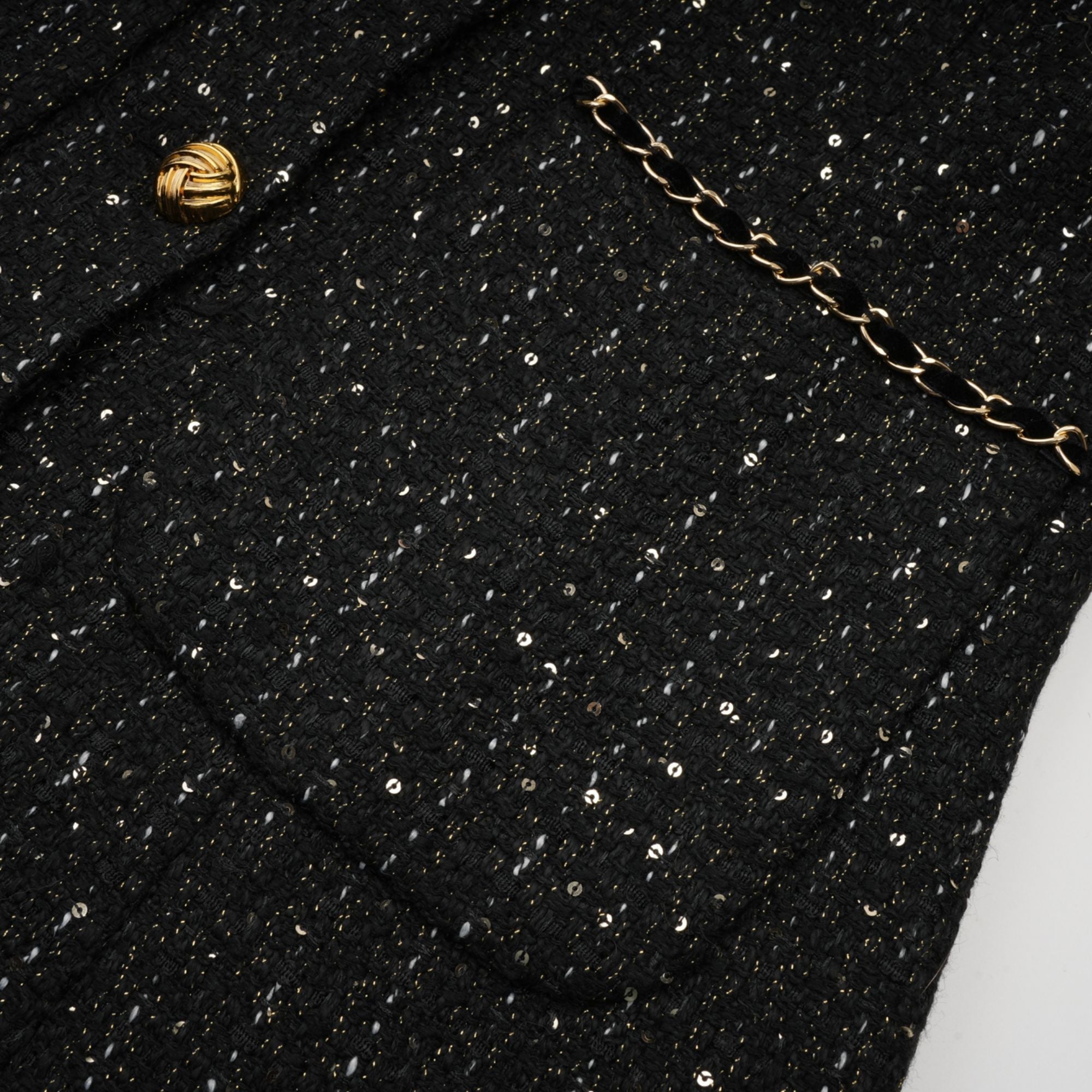 Audrey svart tweed miniklänning med paljettpaneler