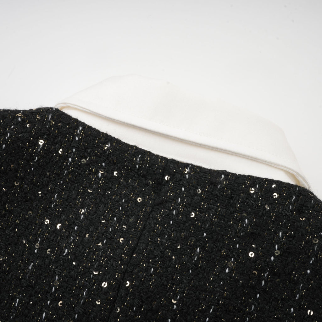 Audrey svart tweed miniklänning med paljettpaneler