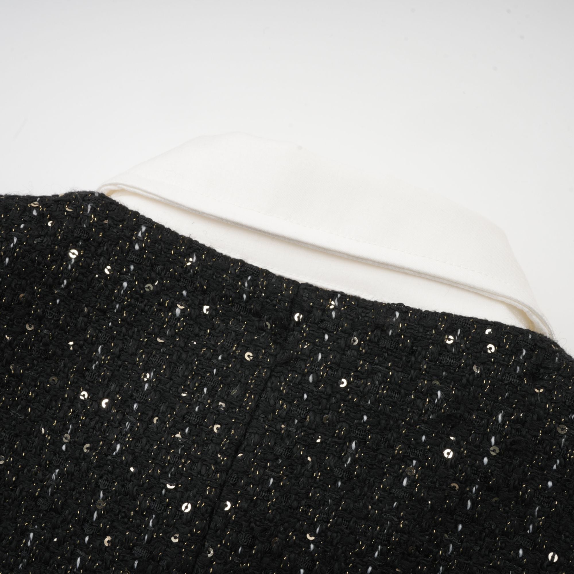 Audrey svart tweed miniklänning med paljettpaneler