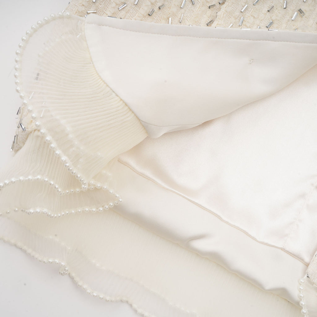 Blanche vit pärl- och volangbeskuren jacka