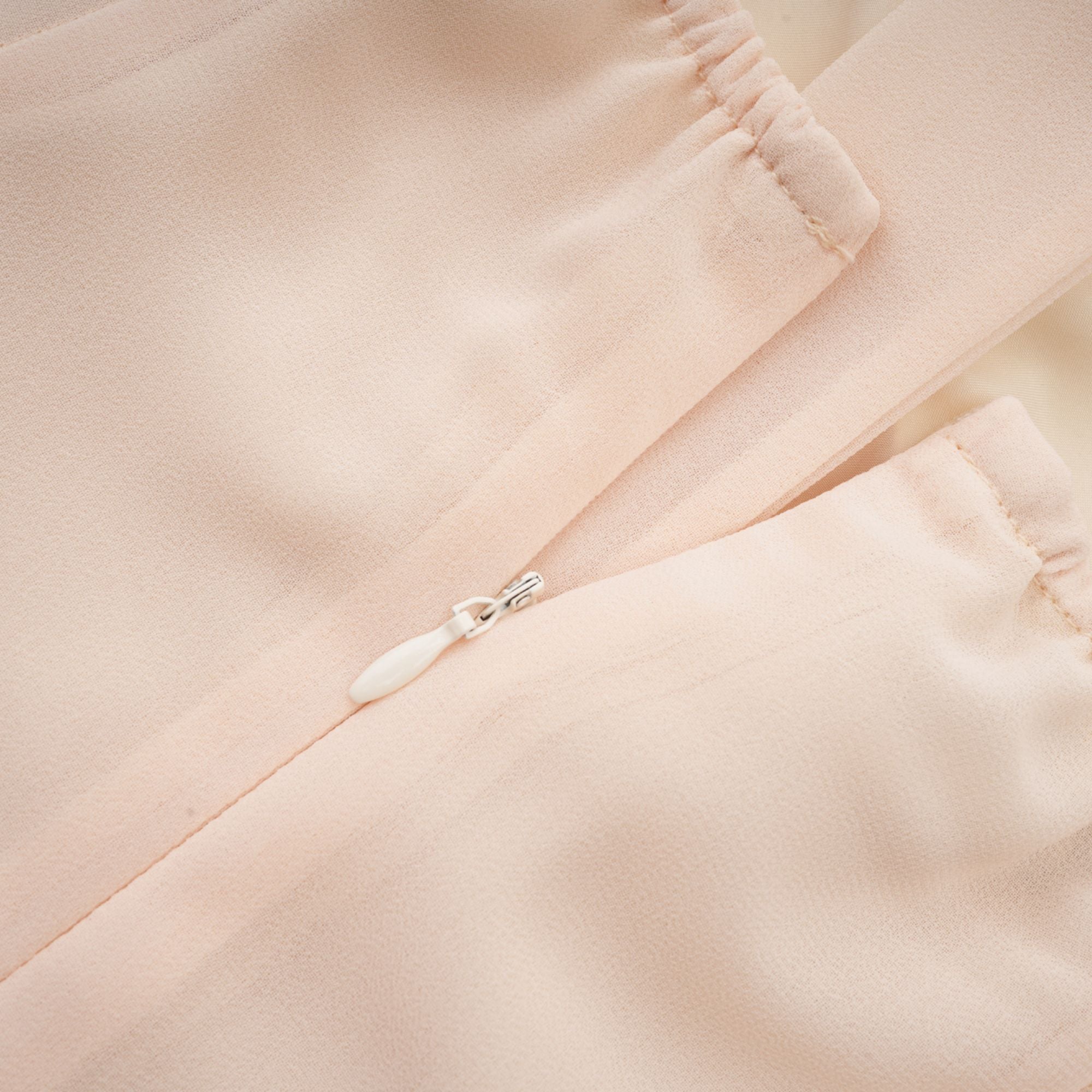 Esmerie Sleeveless Bustier Mini Dress with Back Tie Detail