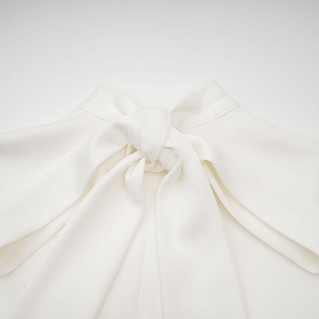 Magali White Sleeveless Maxi Dress with Faux Flower & Bow-Tie Embellishment