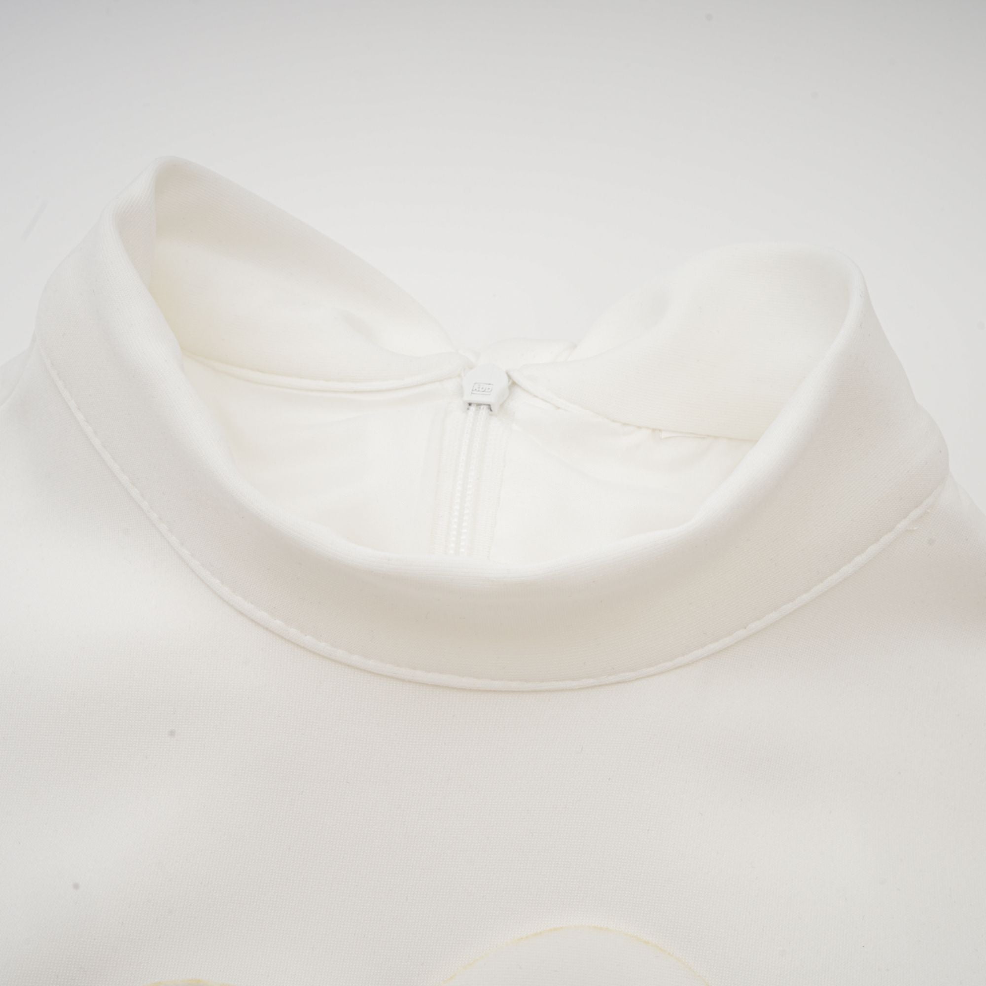 Magali White Sleeveless Maxi Dress with Faux Flower & Bow-Tie Embellishment