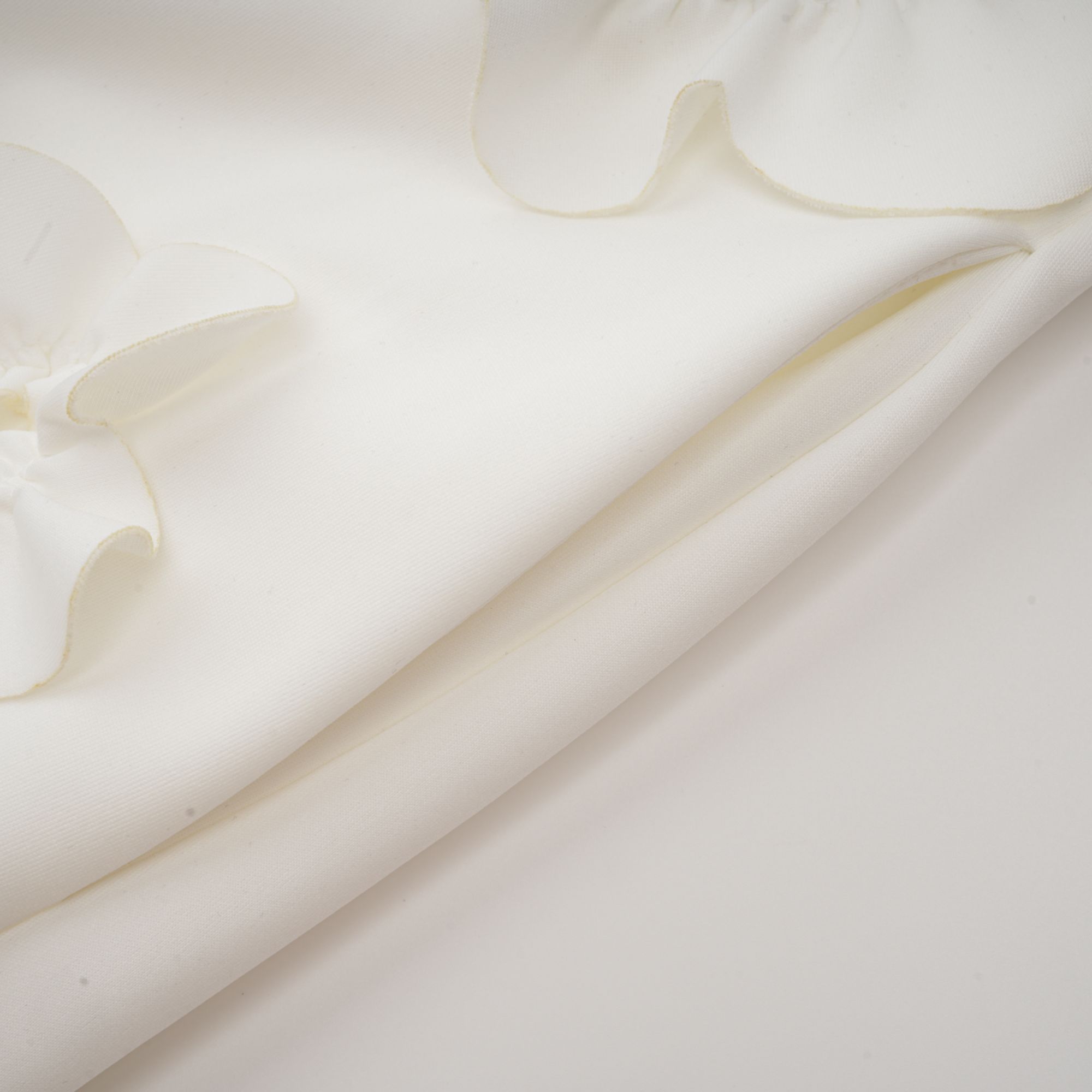 Magali White Sleeveless Maxi Dress with Faux Flower & Bow-Tie Embellishment