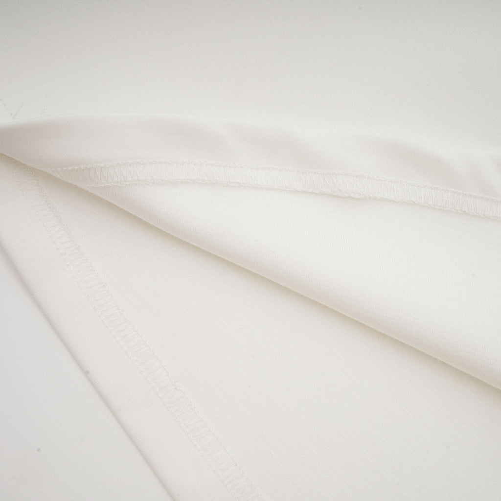 Magali White Sleeveless Maxi Dress with Faux Flower & Bow-Tie Embellishment