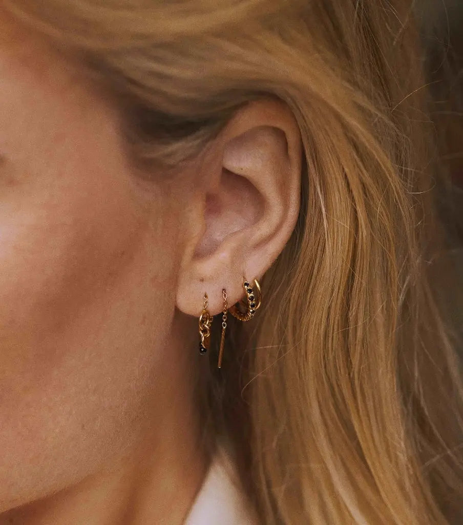 Oorbellen - twister sparkly black