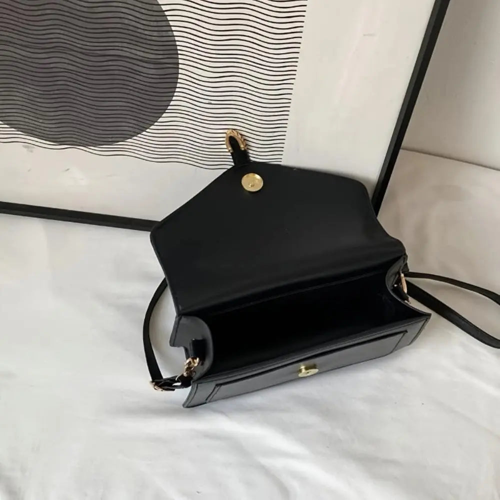 Sorel | Minimalistische Crossbody Tas met Gespsluiting