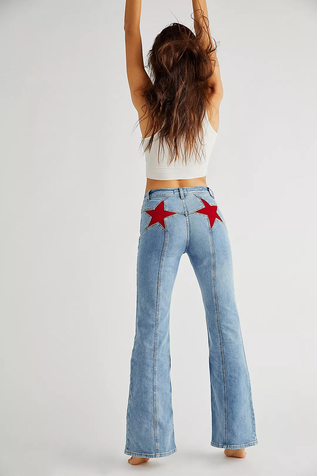 Mugain | Flared High Waist Jeans met Rode Sterren