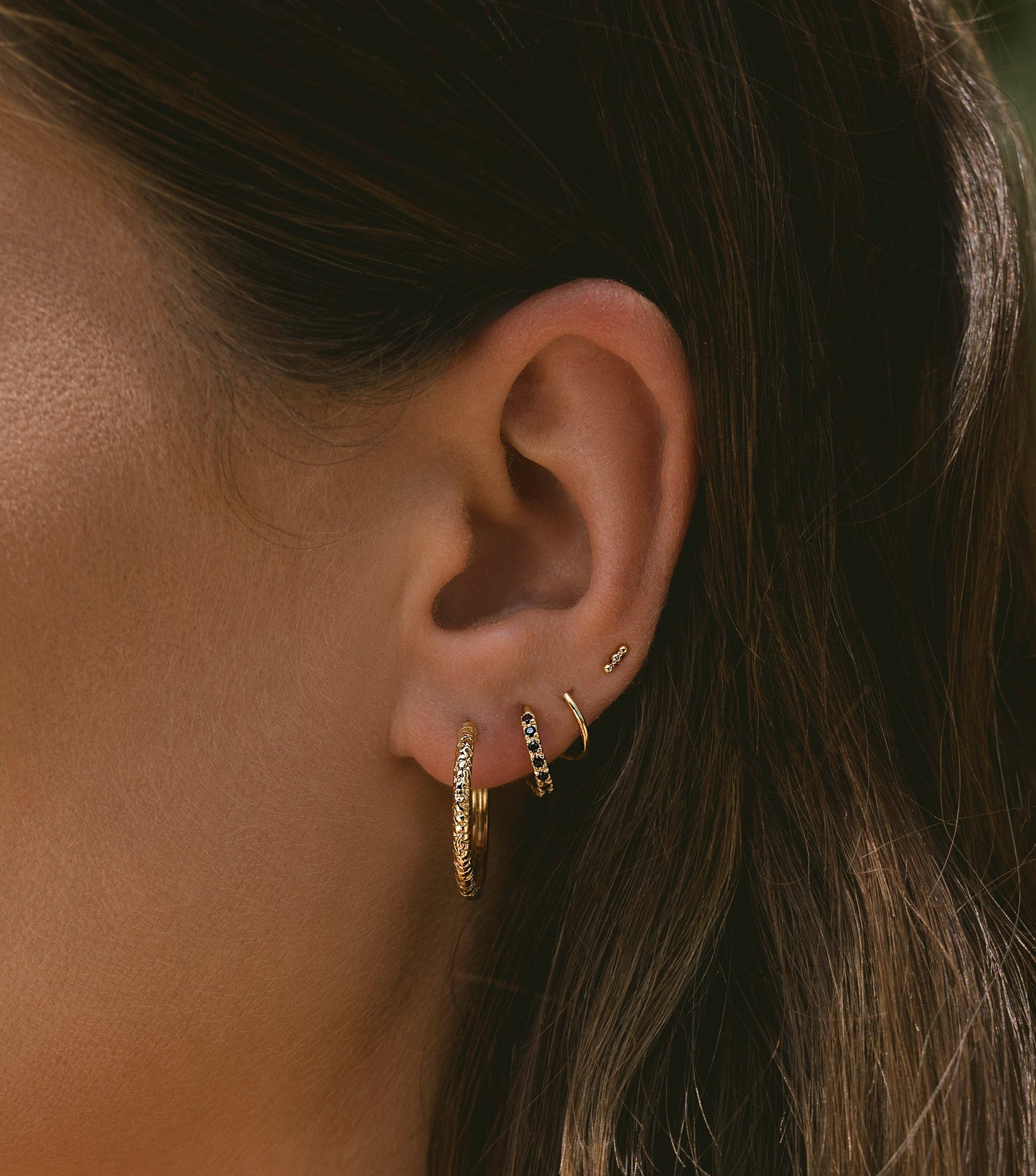 Oorbellen - twister sparkly black