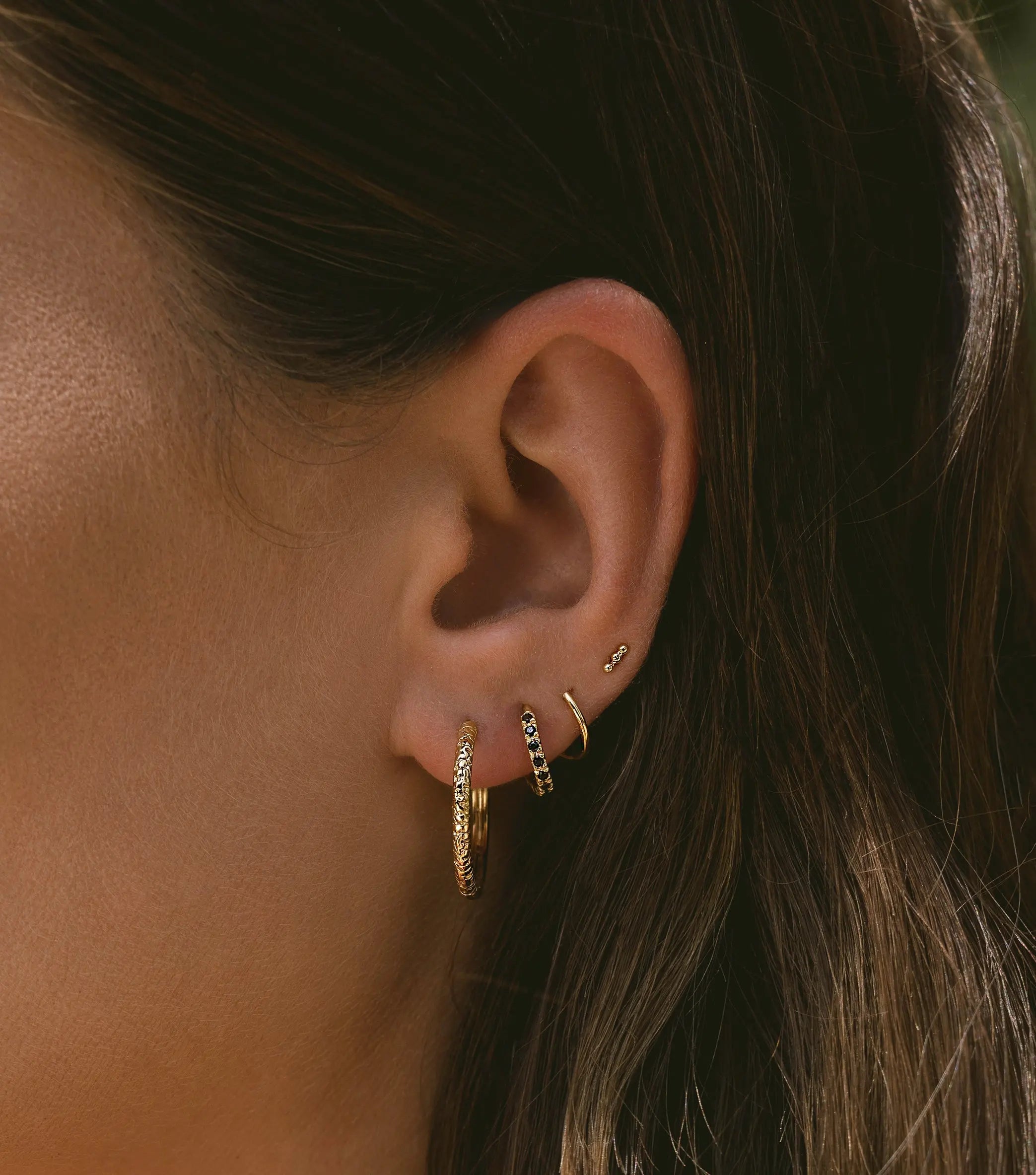 Oorbellen - twister sparkly black